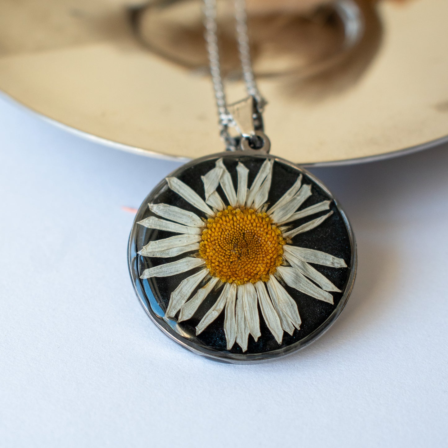 Colgante con margarita