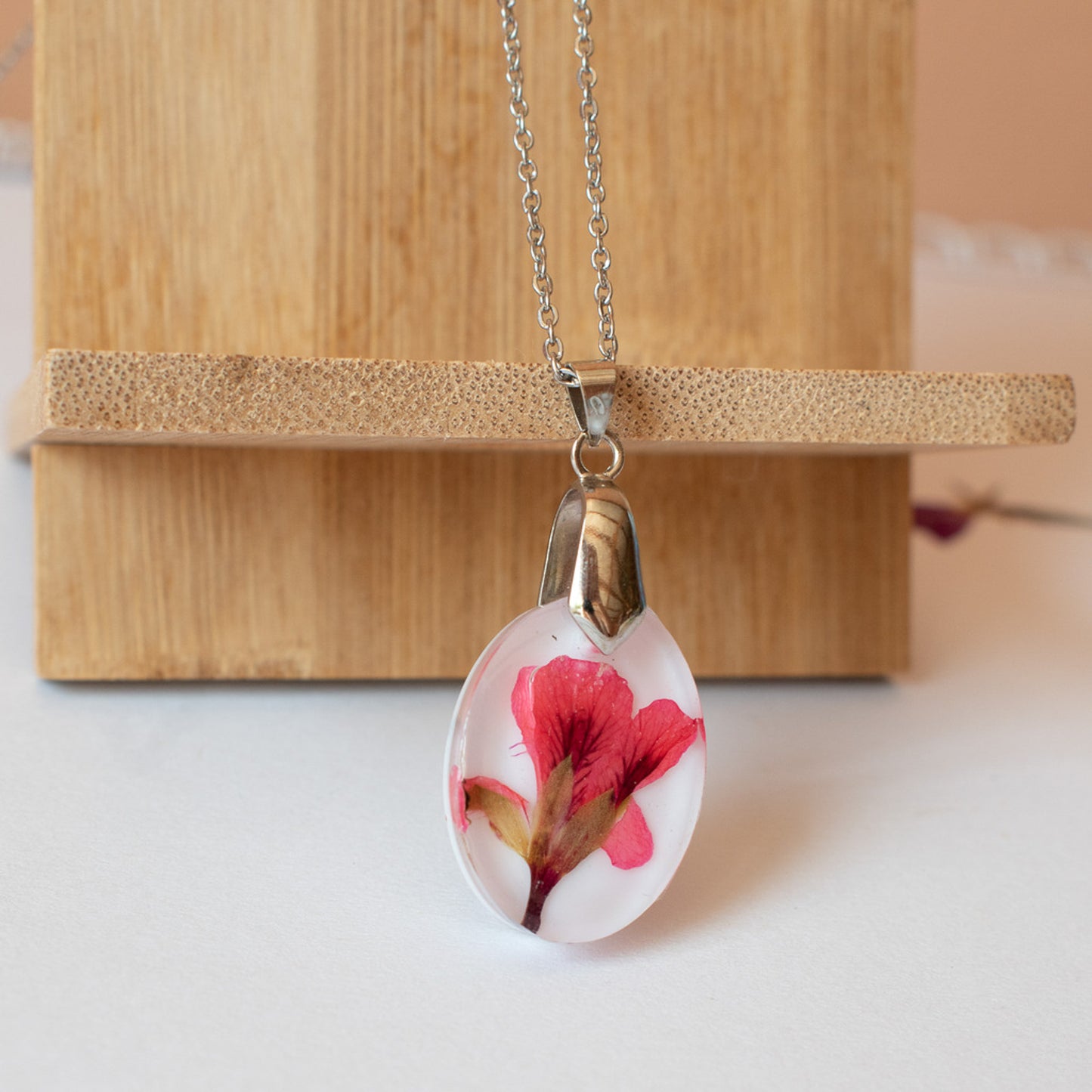 Colgante con flor de geranio