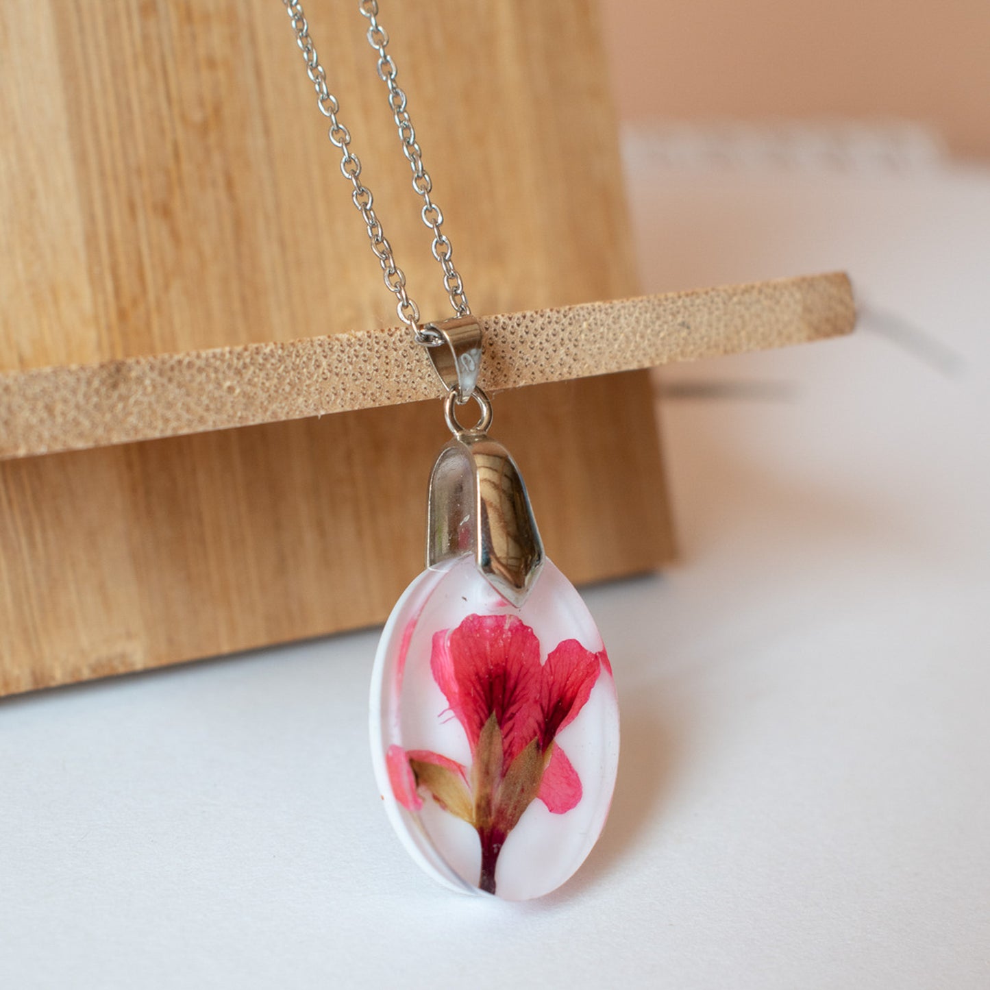 Colgante con flor de geranio
