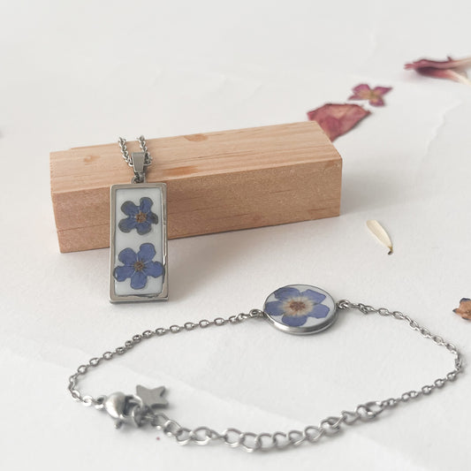 Conjunto colgalte y pulsera Nomeolvides
