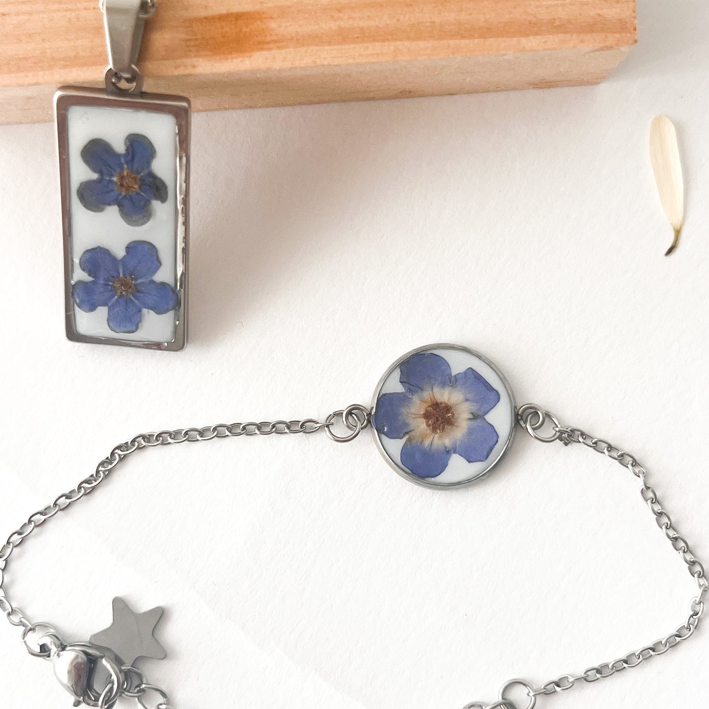 Conjunto colgalte y pulsera Nomeolvides